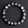 Natural obsidian crater ball bracelet with meteorite texture in silver stone and gold obsidian colour variations