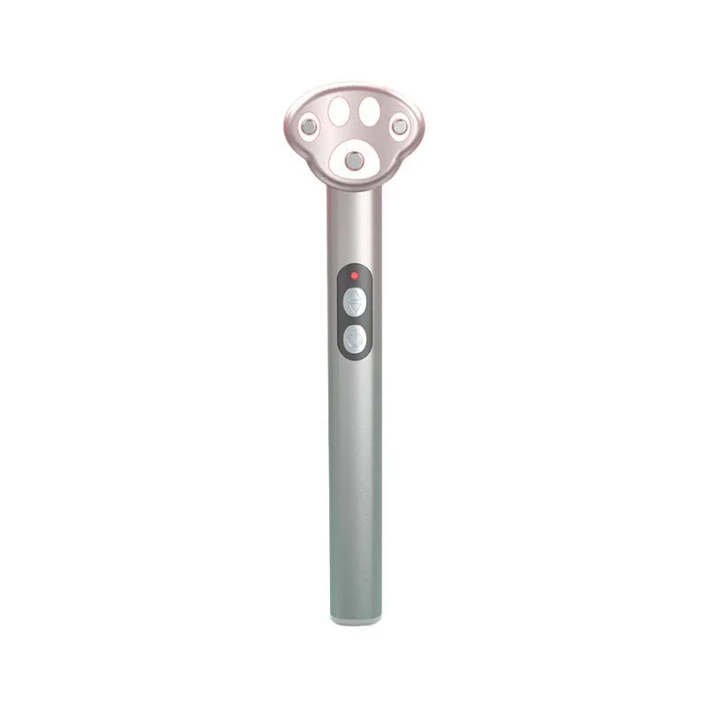 Gradient pink cat's paw shaped eye massager with micro-current technology and charging cable