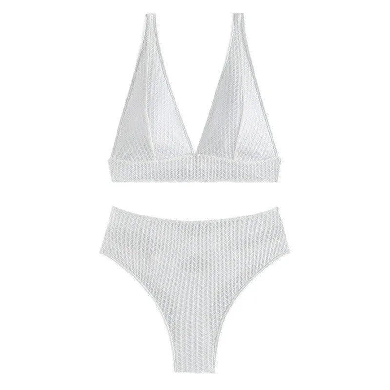 White backless bikini swimsuit with briefs bottom on a mannequin.