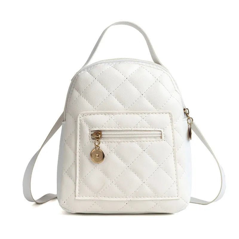 Hard shell white Korean style embroidered girls backpack with soft handle on a square background.
