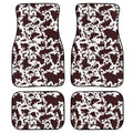 Set of four black rubber car floor mats with a textured surface and raised edges, shown in a vehicle footwell.