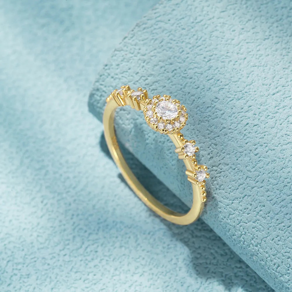 925 silver women's ring with gold electroplated finish, flower rhinestone detailing and geometric shape