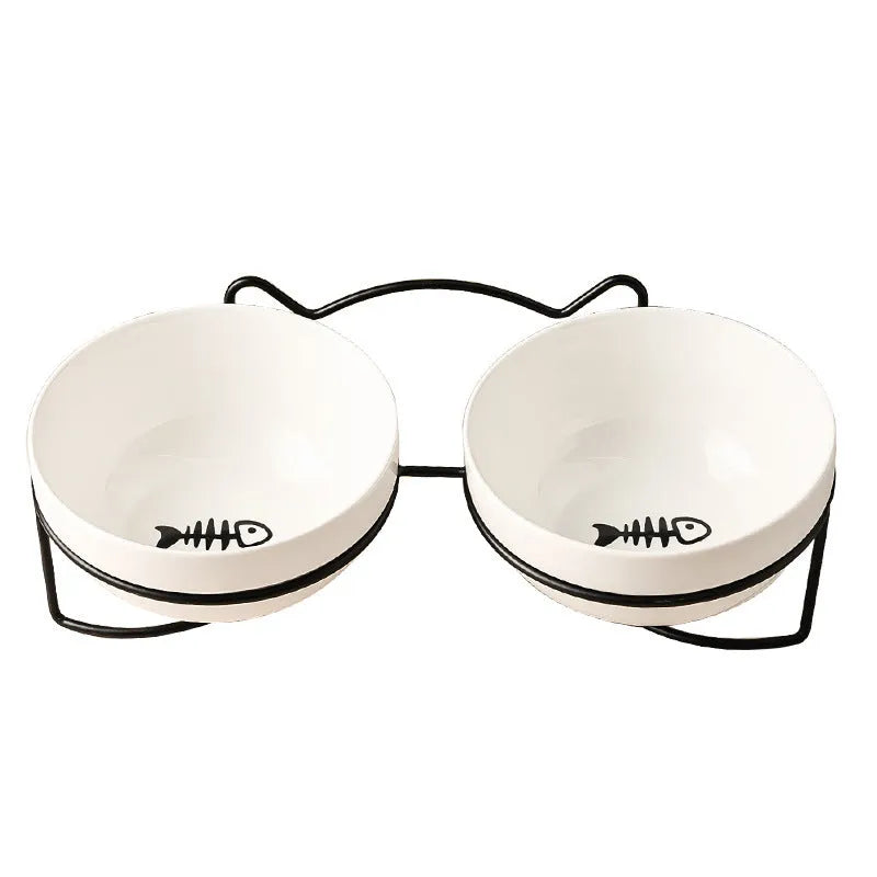 Ceramic cat bowl in an iron frame, showing cat paw print and fishbone pattern options