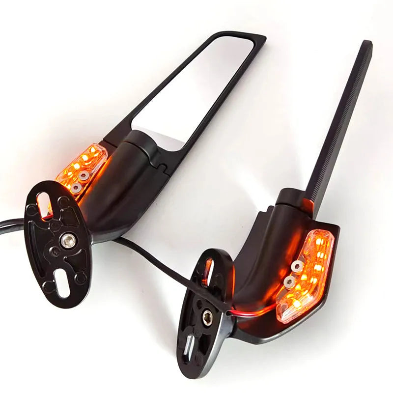 Pair of yellow motorcycle rearview mirrors with integrated running reflectors, showing convex glass lens and aluminium housing.