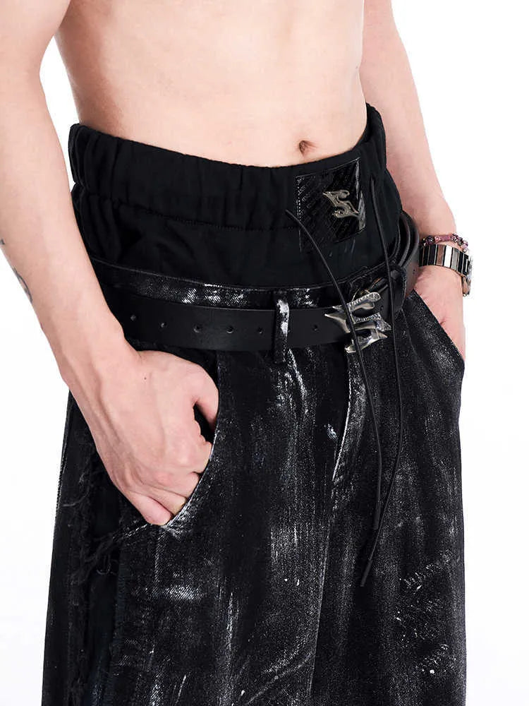 Black men's leather belt with a metal letter buckle, made from two-layer cowhide, laid flat to show its 110cm length.