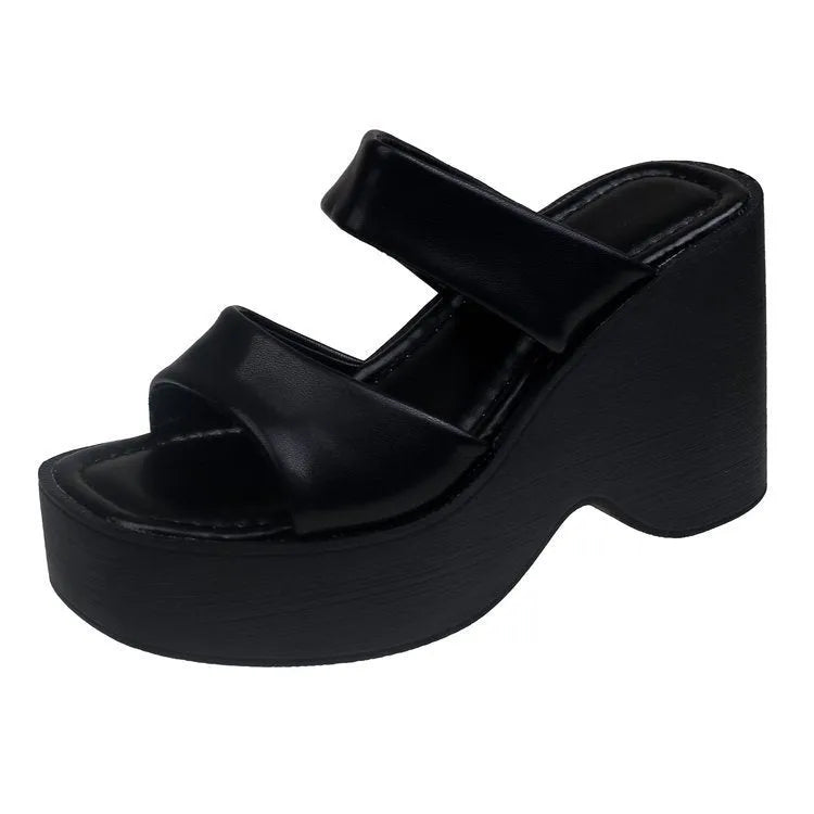 Women's black wedge platform slippers with a square toe and PU upper material.