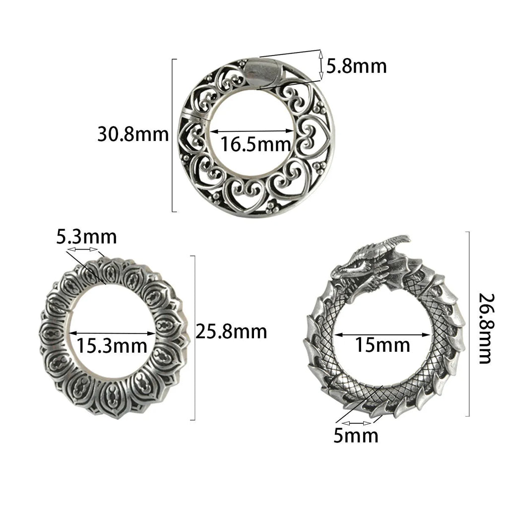 Retro geometric dragon silhouette earrings in antique silver, showing hollow-out design and large size.