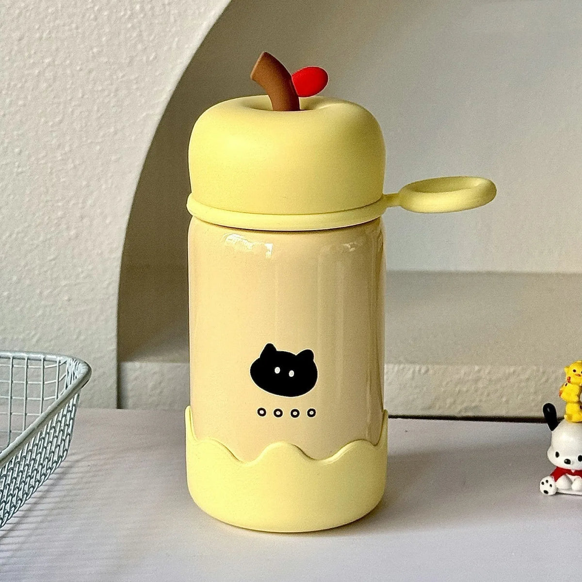 Children's cartoon thermal mug 300ml with 316 stainless steel liner, rope handle, and silicone bottom pad in yellow