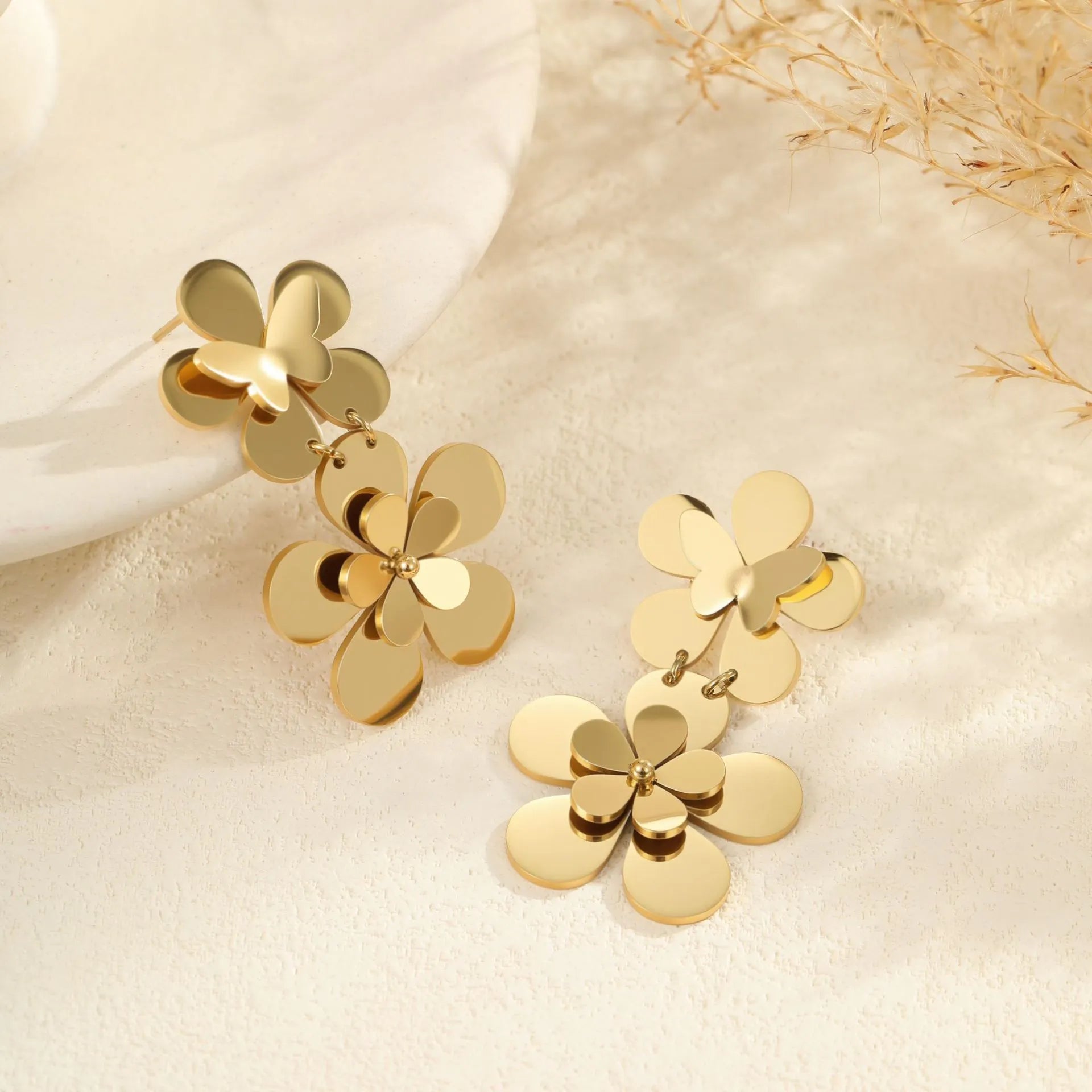 Gold flower butterfly stainless steel earrings for women with geometric details