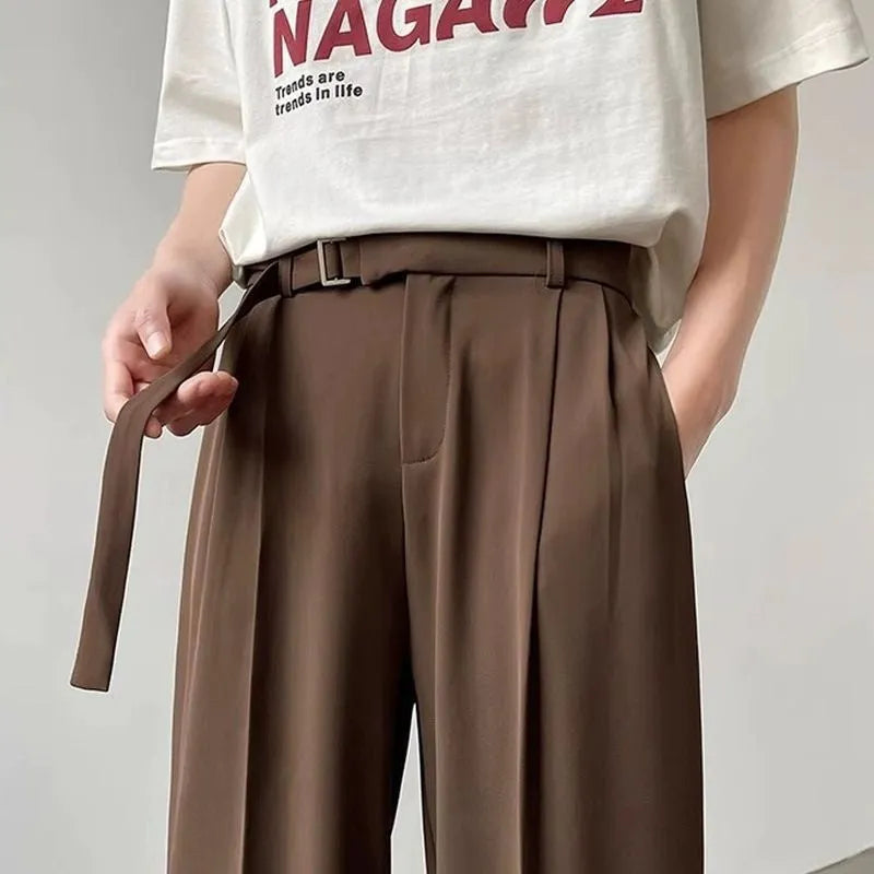 Women's thin straight wide leg trousers in black, showcasing loose fit and non-ironing fabric.