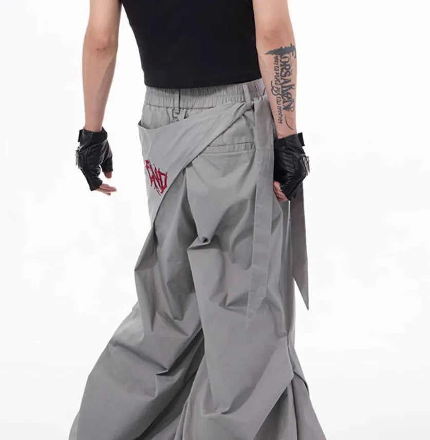 Boy modelling black wide-leg summer pants in a refined Korean style