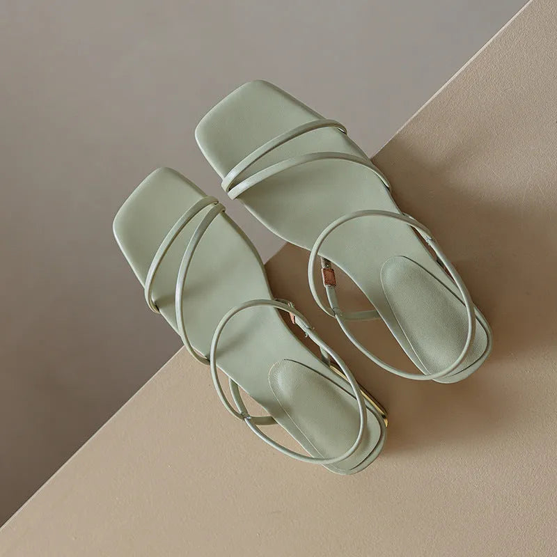 Flat strap open-toed Roman sandals for women in microfiber with square toe, shown in beige, green, or white.