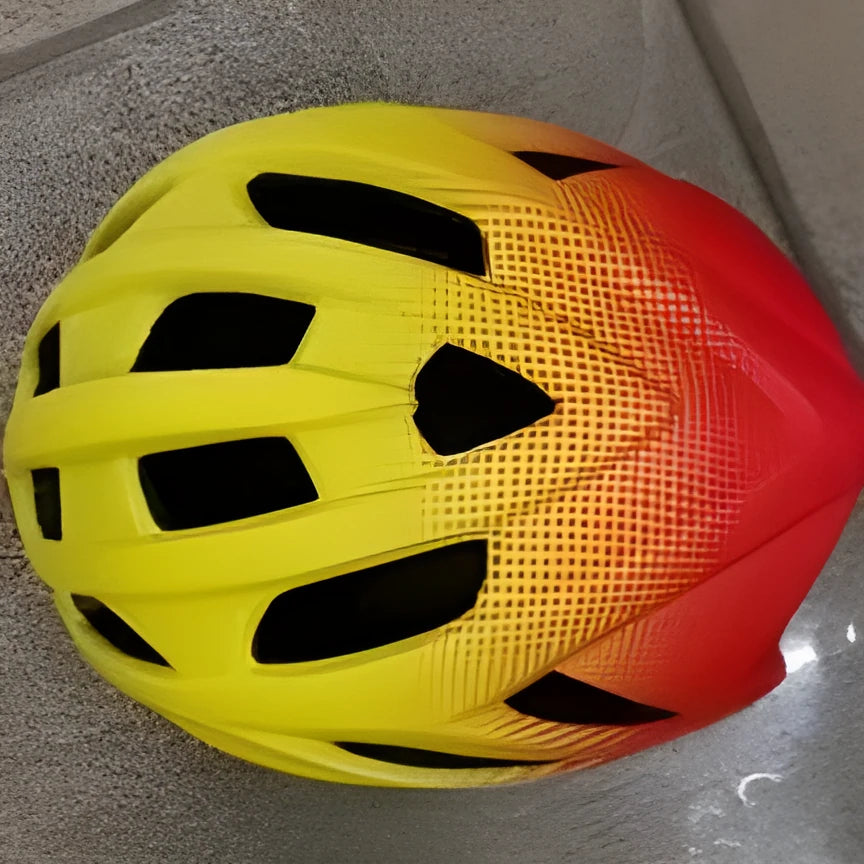 Orange mountain bike helmet with multiple vents shown on a white background.