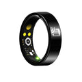Black ceramic smart ring for health monitoring on a finger, shown with a magnetic charging cable.