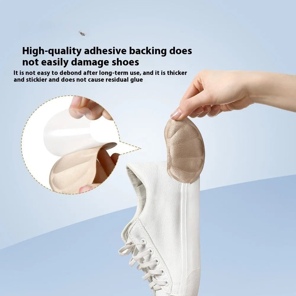 Camel-coloured suede heel cushion pads with adhesive backing for sneakers
