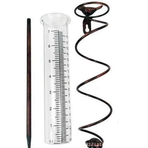 Cast iron bird-shaped rain gauge with glass measurement tube showing 1-20 scale and 800ml capacity