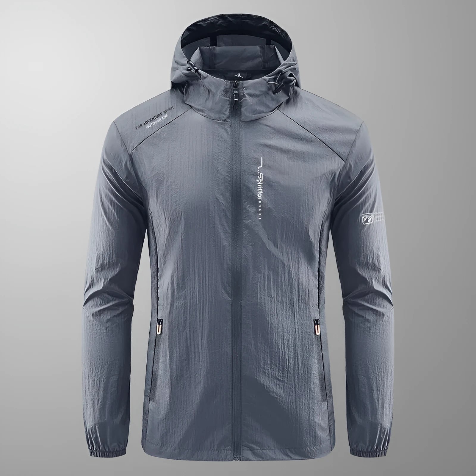 Man wearing a light grey loose-fit hooded nylon summer jacket outdoors.