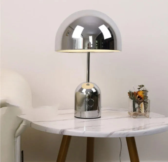 Mushroom-shaped table lamp in rose gold finish with a metal base, measuring 280mm wide.