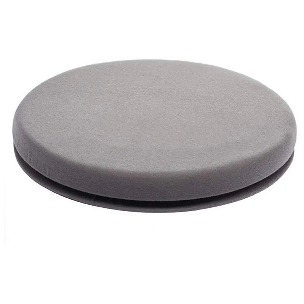 360-degree rotating grey car seat cushion with non-slip base on a car seat.