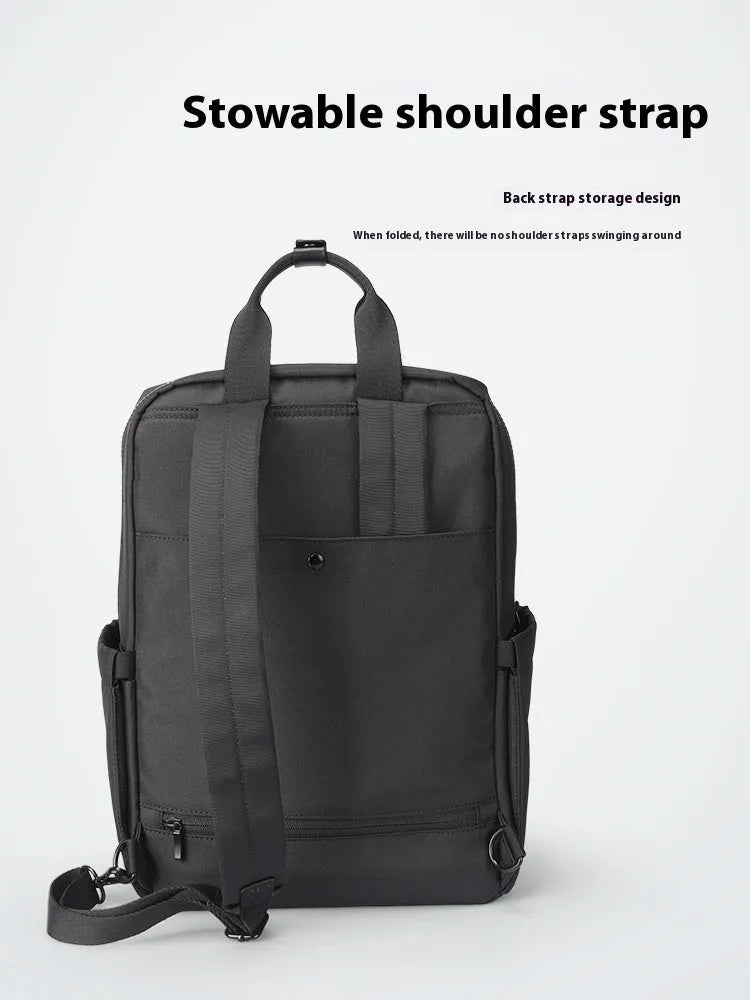 Black Oxford cloth computer backpack showing storage compartments and 20-35 litre capacity