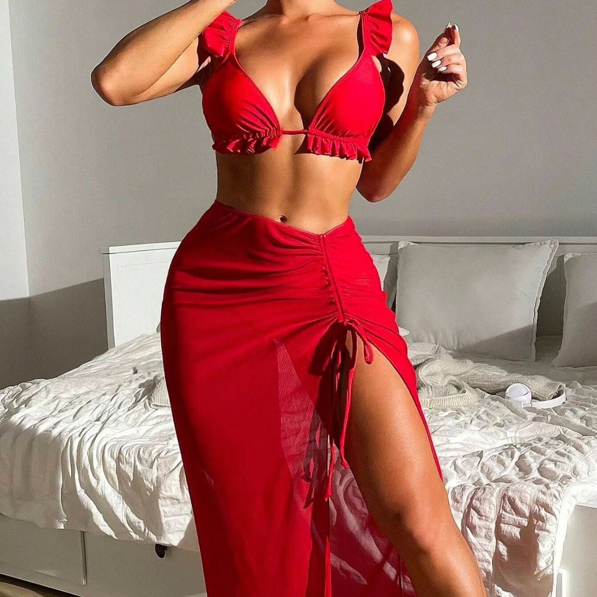 Women's printed split swimsuit three-piece set with bikini top, split bottoms, and coordinating swim skirt