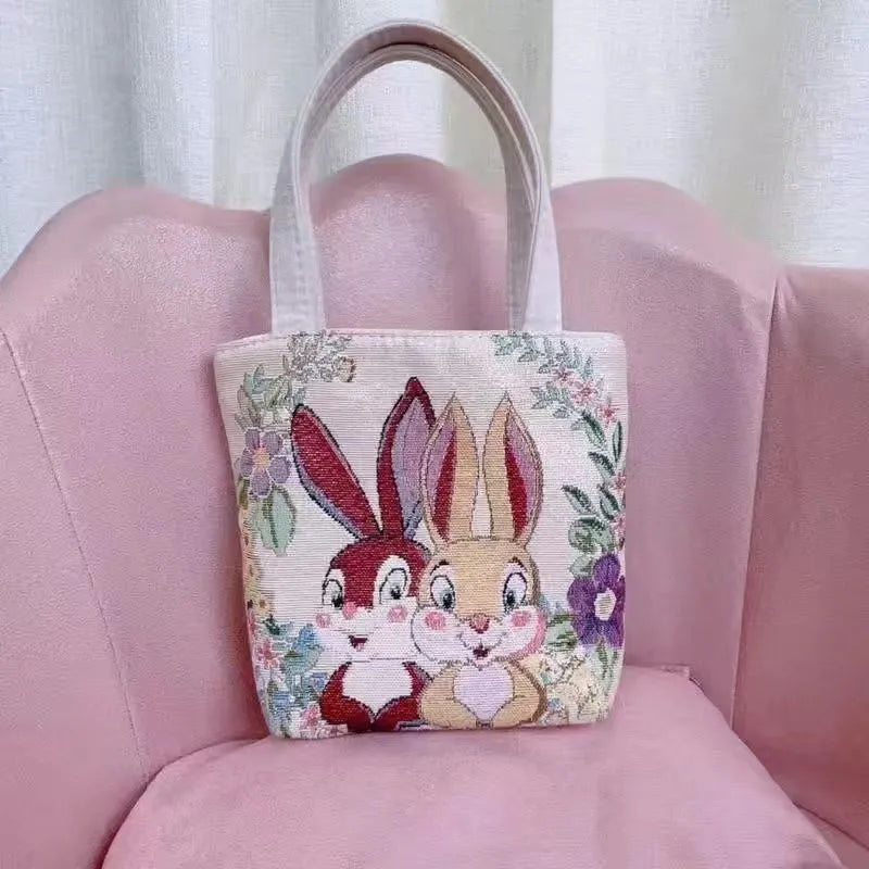 Canvas tote bag with gold wire embroidery in Bunny pattern, showing double-sided stitching detail