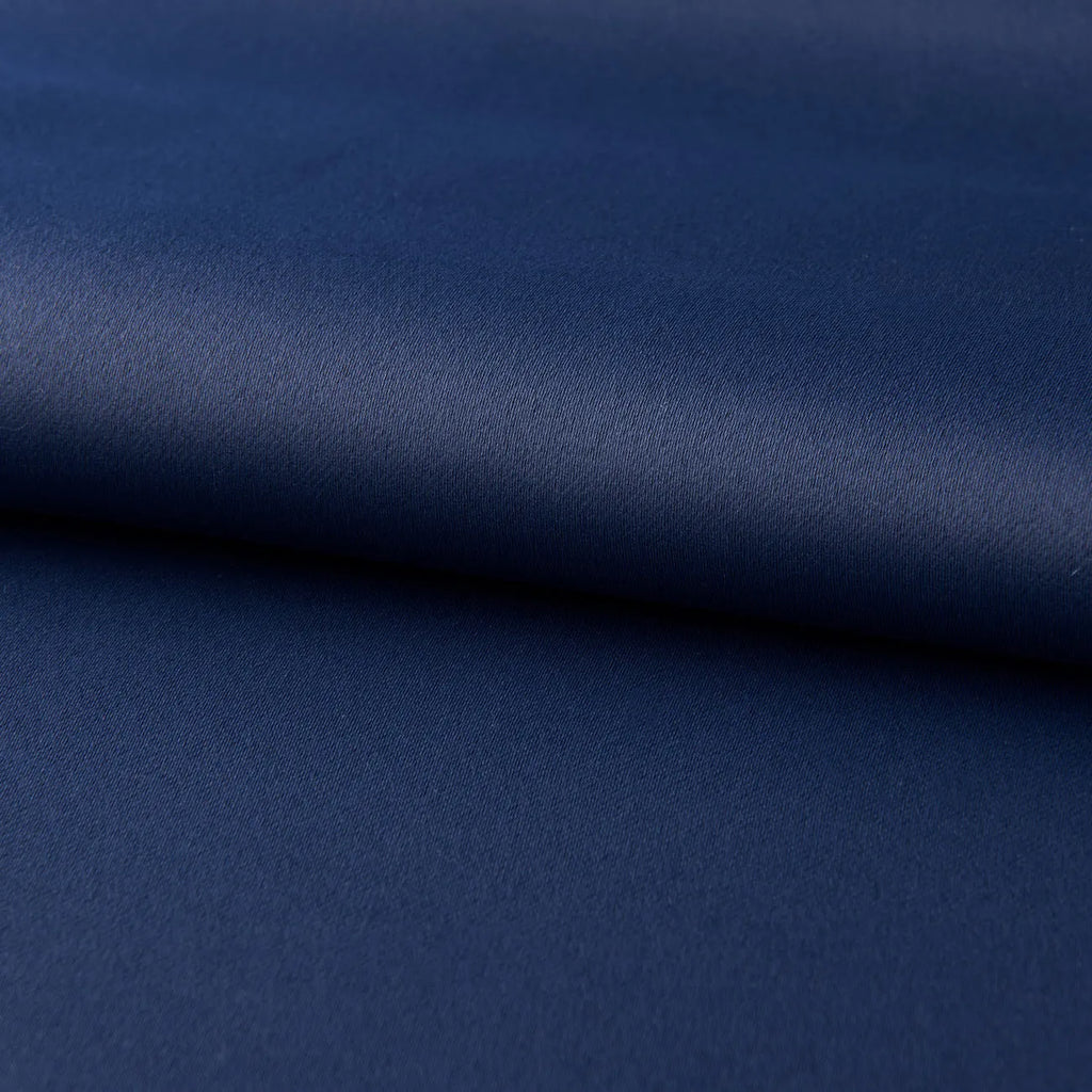Dark navy blue modern blackout curtain made from shading cloth, hanging as a finished vertical panel.