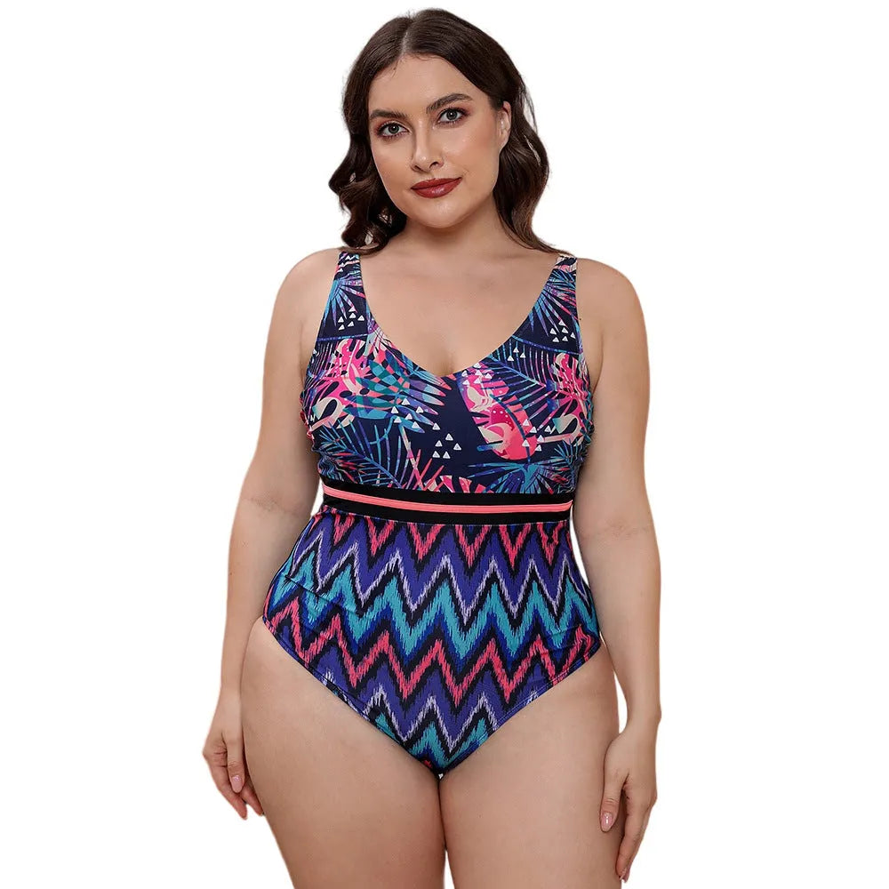 Women's printed one-piece swimsuit with spaghetti straps and a striped vest design.