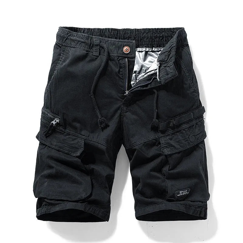 Men's army green cotton shorts with zipper and multiple pockets, shown in a Korean style fit.