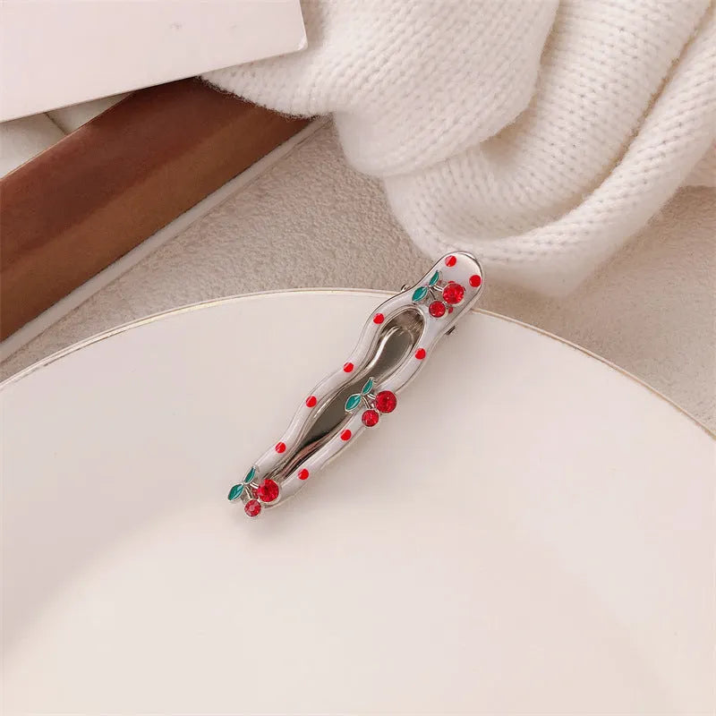 Red stereo love heart-shaped hairpin with French retro dots and willow leaf design
