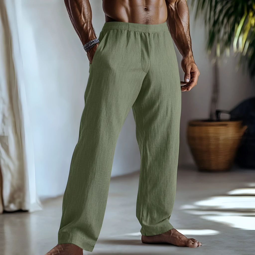 Straight-leg cotton and linen trousers in British casual style with front pockets.