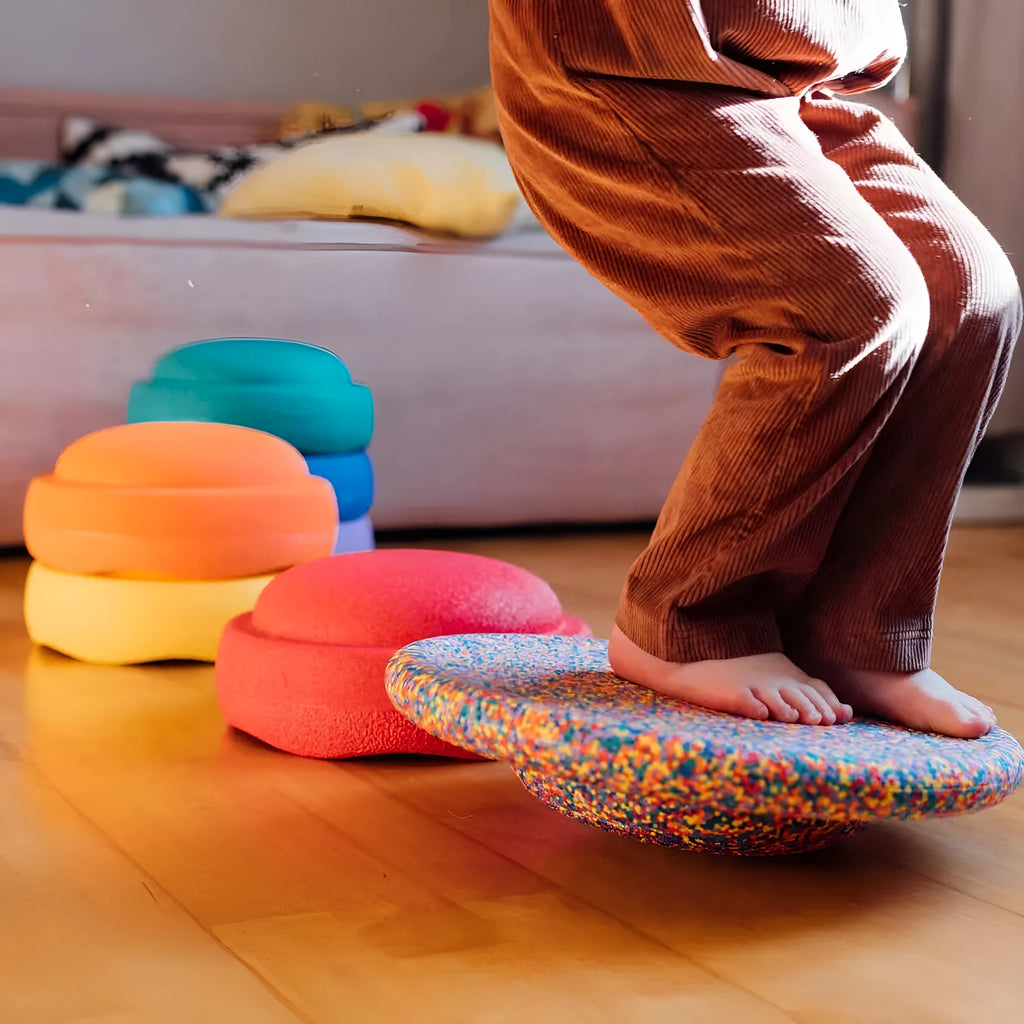 Plastic wood-grain surf balance board for a child aged 4-6 years.