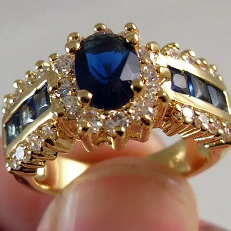 Zinc alloy fashion ring with diamond or zircon stone detailing in sunflower blue, square blue, or square purple designs.