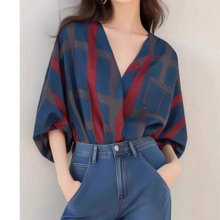Women's loose polyester pullover top with painted finish and drop-shoulder sleeves in short length, front view