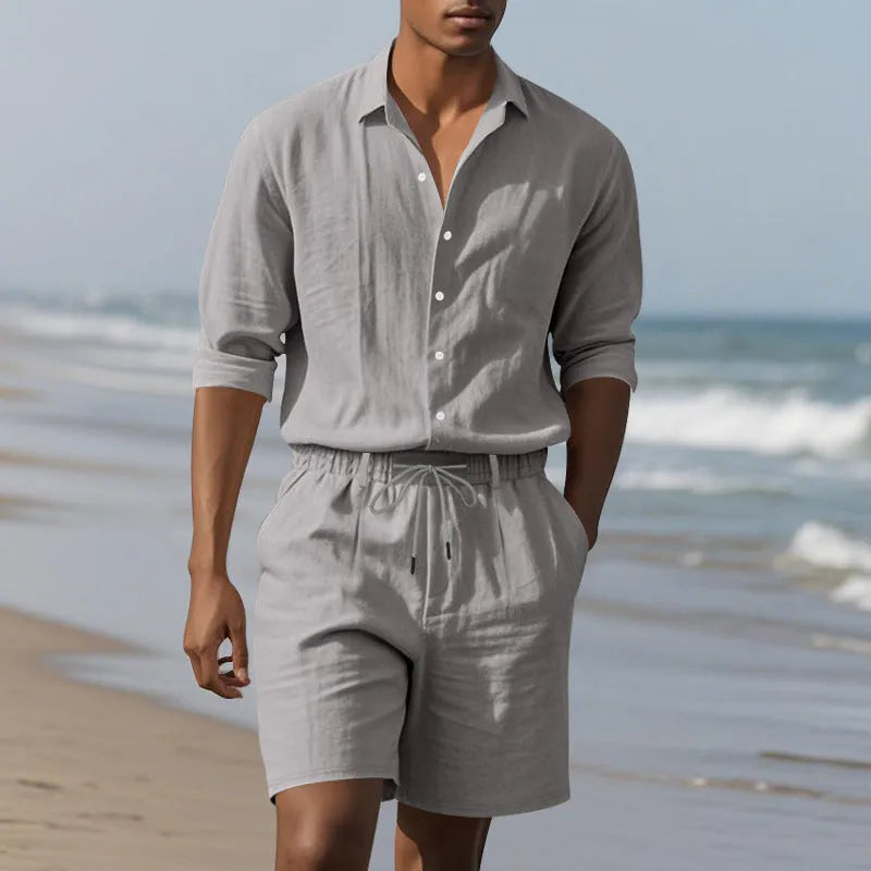 Men's linen beach suit showing long sleeve shirt and matching shorts in light blue colour