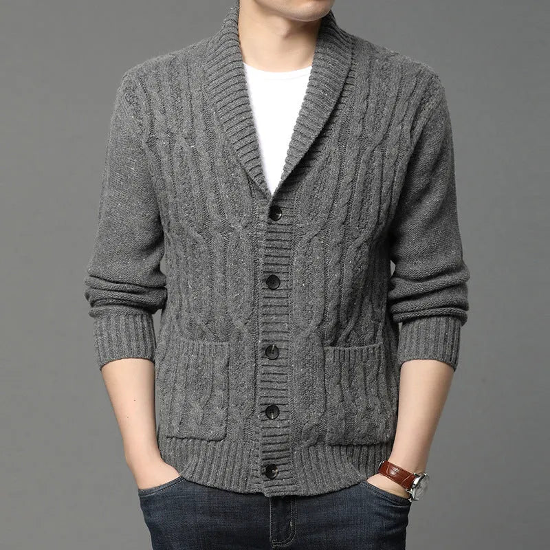 Man wearing a black Korean-style jacquard patterned knitted cardigan jacket.