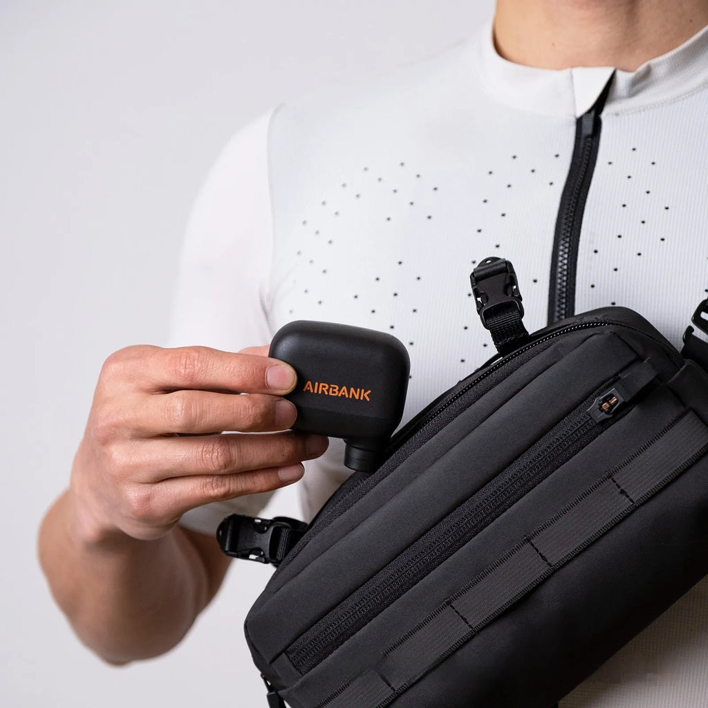 AS100 black electric bicycle pump with USB charging cable and waterproof storage bag