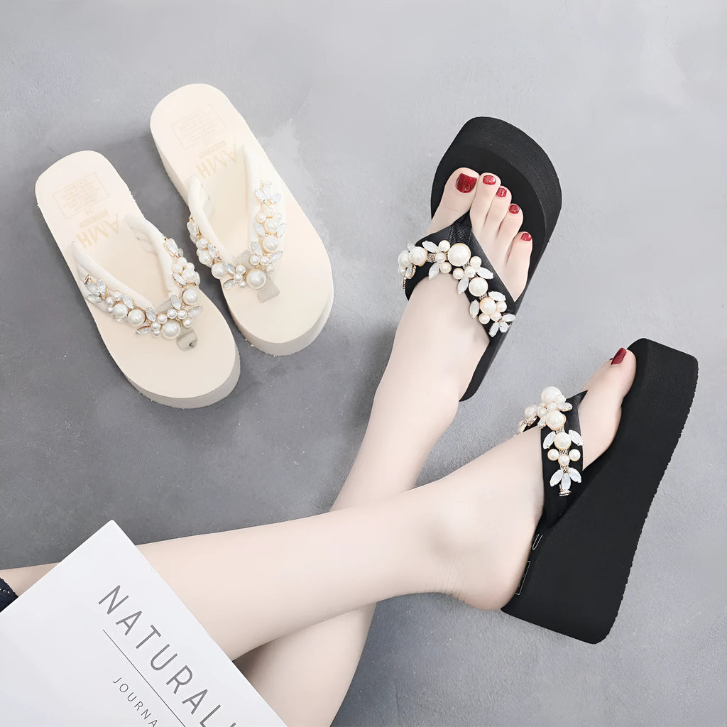 Women's beige high-heeled flip-flops with cotton cloth upper, shown from the side.
