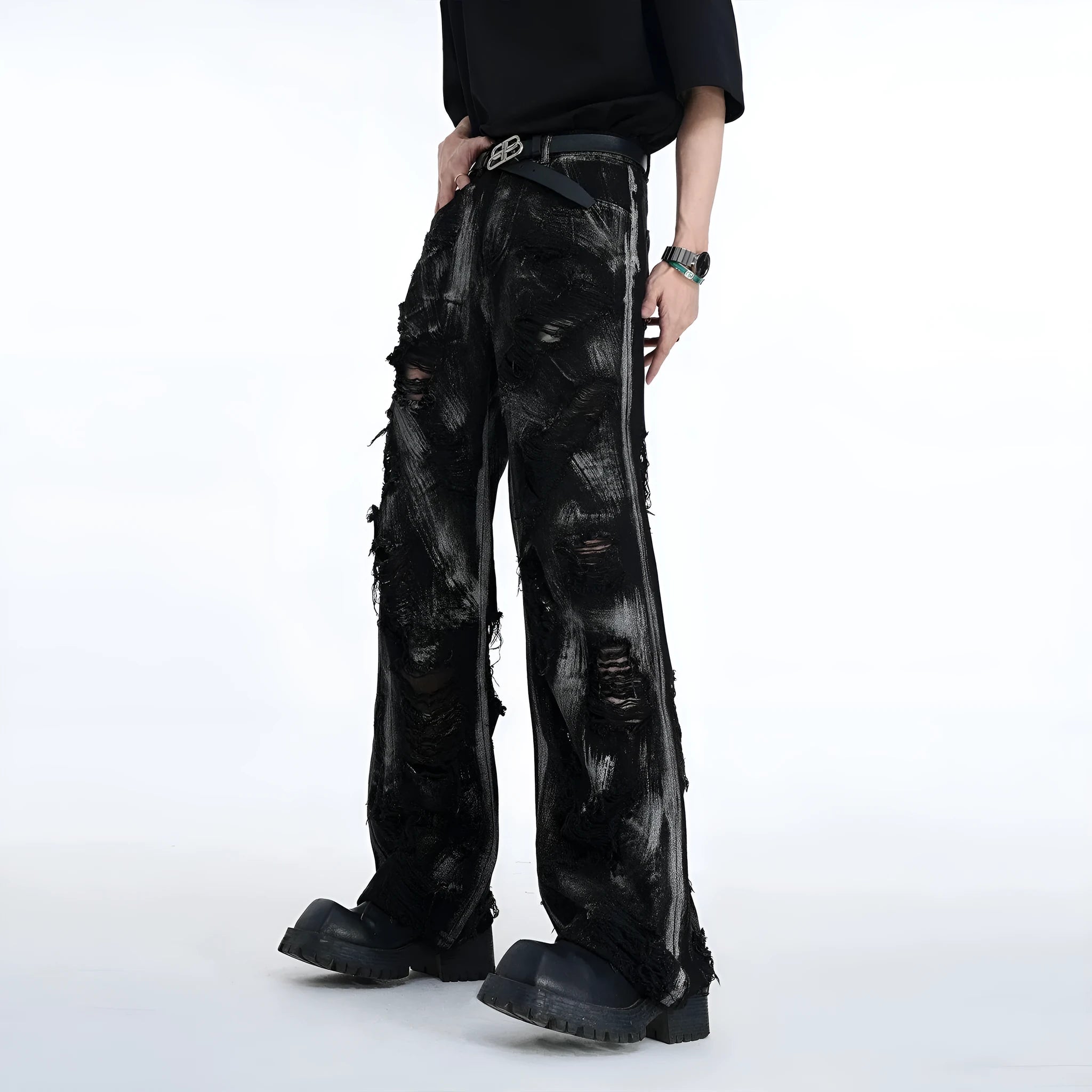 Men's grey pink graffiti detail denim trousers laid flat, showing mid-waist and zipper fly.