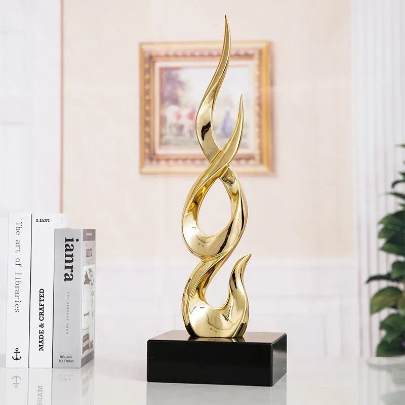 Resin festival high-rise decoration craft in bright gold colour with modern simplicity design