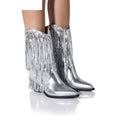 Women's black chunky heel tassel boots with a high stiletto heel and pointed toe on a white background.