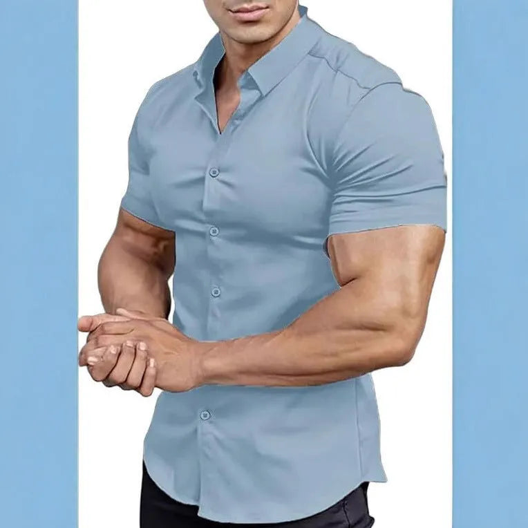 Man wearing a brown short sleeve printed casual shirt with a collar.