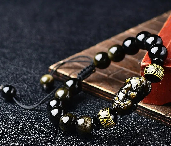 Hand-woven golden obsidian Pi Xiu bracelet with natural stone beads in Chinese zodiac style