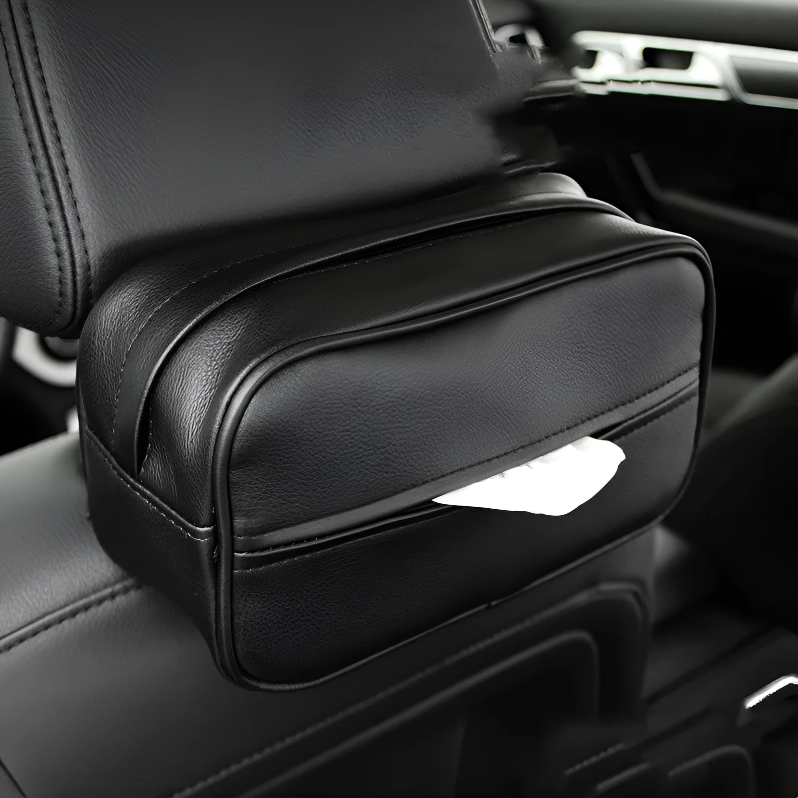 Black PU leather car hanging organiser bag with paper insert for storing documents.