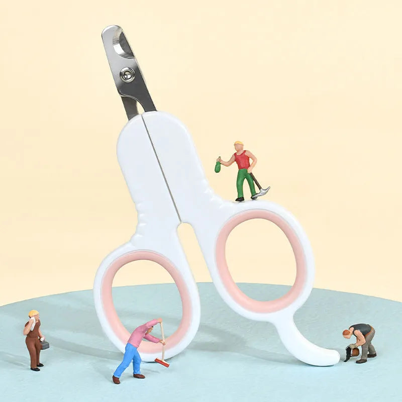 Grey and pink pet nail clippers with curved tips and a rubber-coated anti-slip handle on a white background.