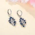 Women's alloy drop earrings with blue crystal stones in a platinum sapphire blue colour