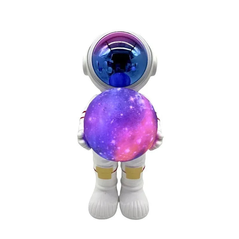 Spaceman starry sky projection lamp on a table, showing star pattern projection