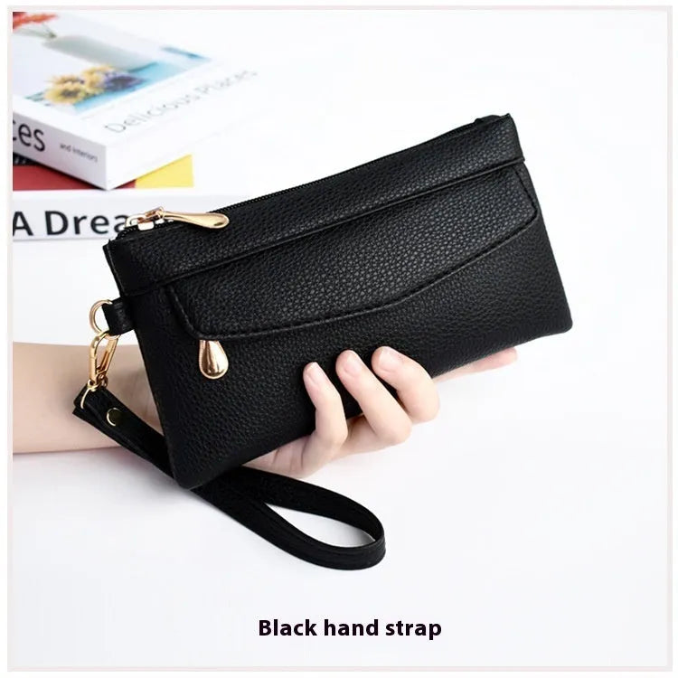 Soft PU leather crossbody bag in a square shape showing the internal sandwich zipper pocket.