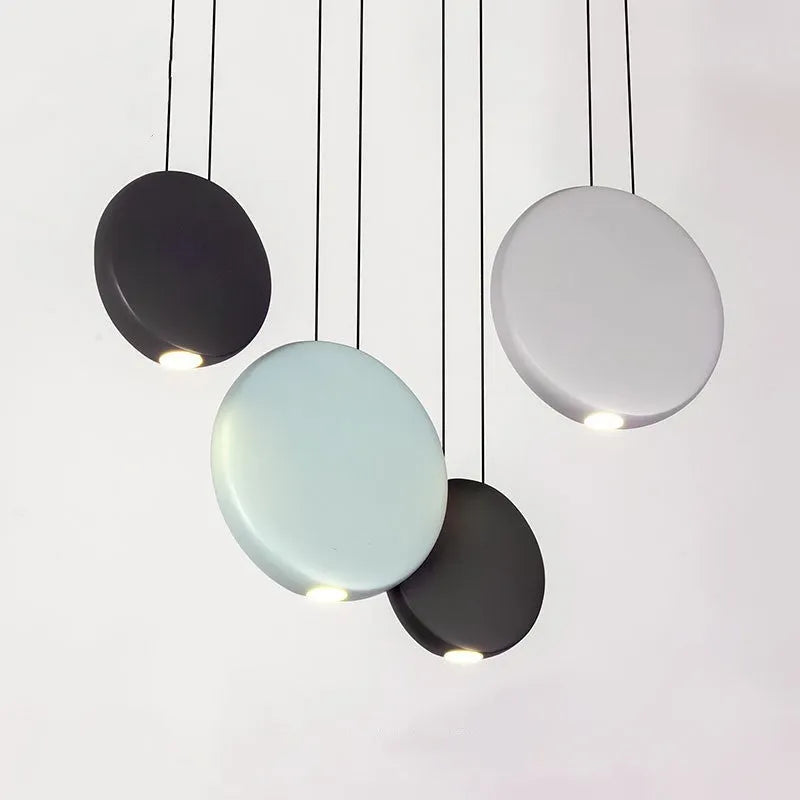 Round crystal-style resin ceiling chandelier with adjustable height, shown illuminated.