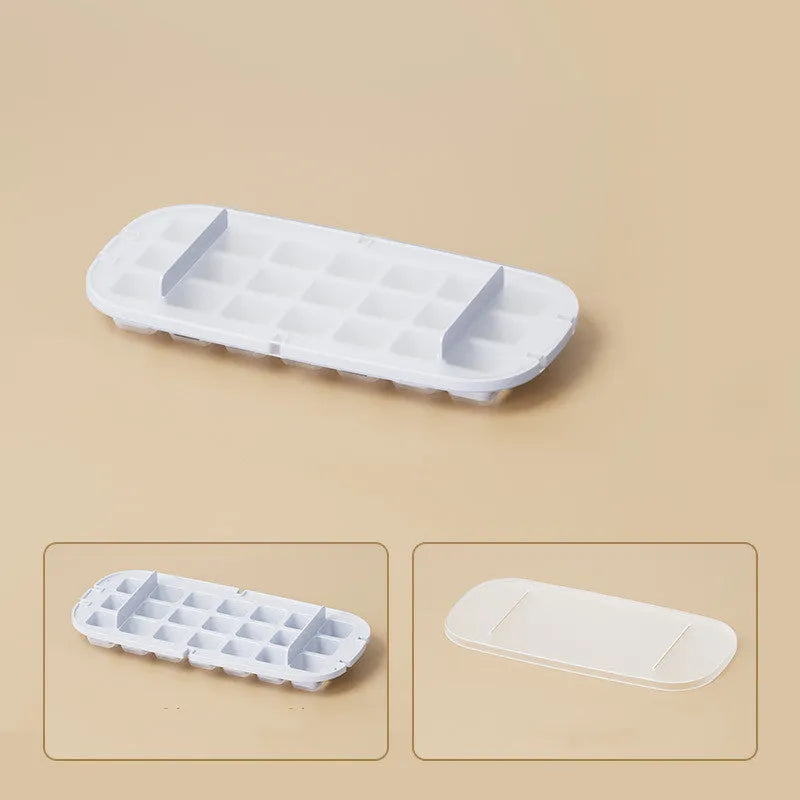 Food-grade high-capacity ice cube tray in blue with integrated storage for an ice shovel.